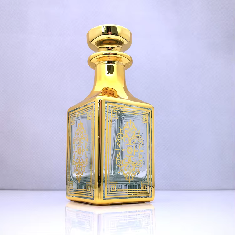 Khalid & Co. signature attar bottle — gold filigree
